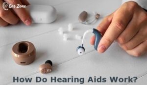 Featured image of a person holding a hearing aid. Article on How do hearing aids work?