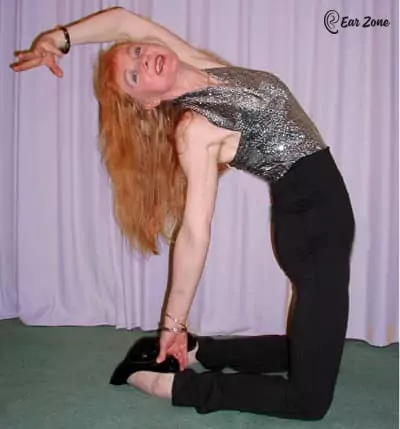 Ardh Usrtasana or half-camel pose. Ear Zone blog Yoga For Tinnitus